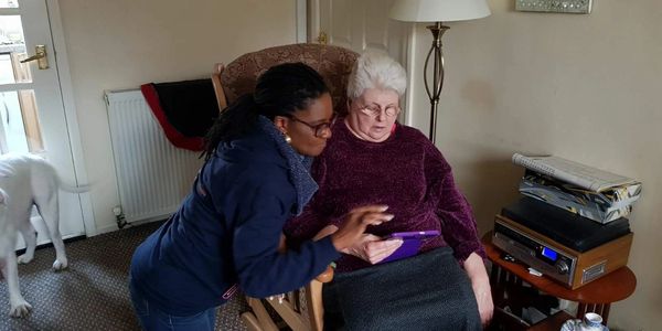 The Widows Empowerment Trust offering their Befriending Service to a client.