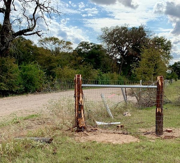 Cedar Post and Barbed Wire Ranch Fence