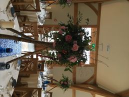 Silver birch tripods with fresh flowers