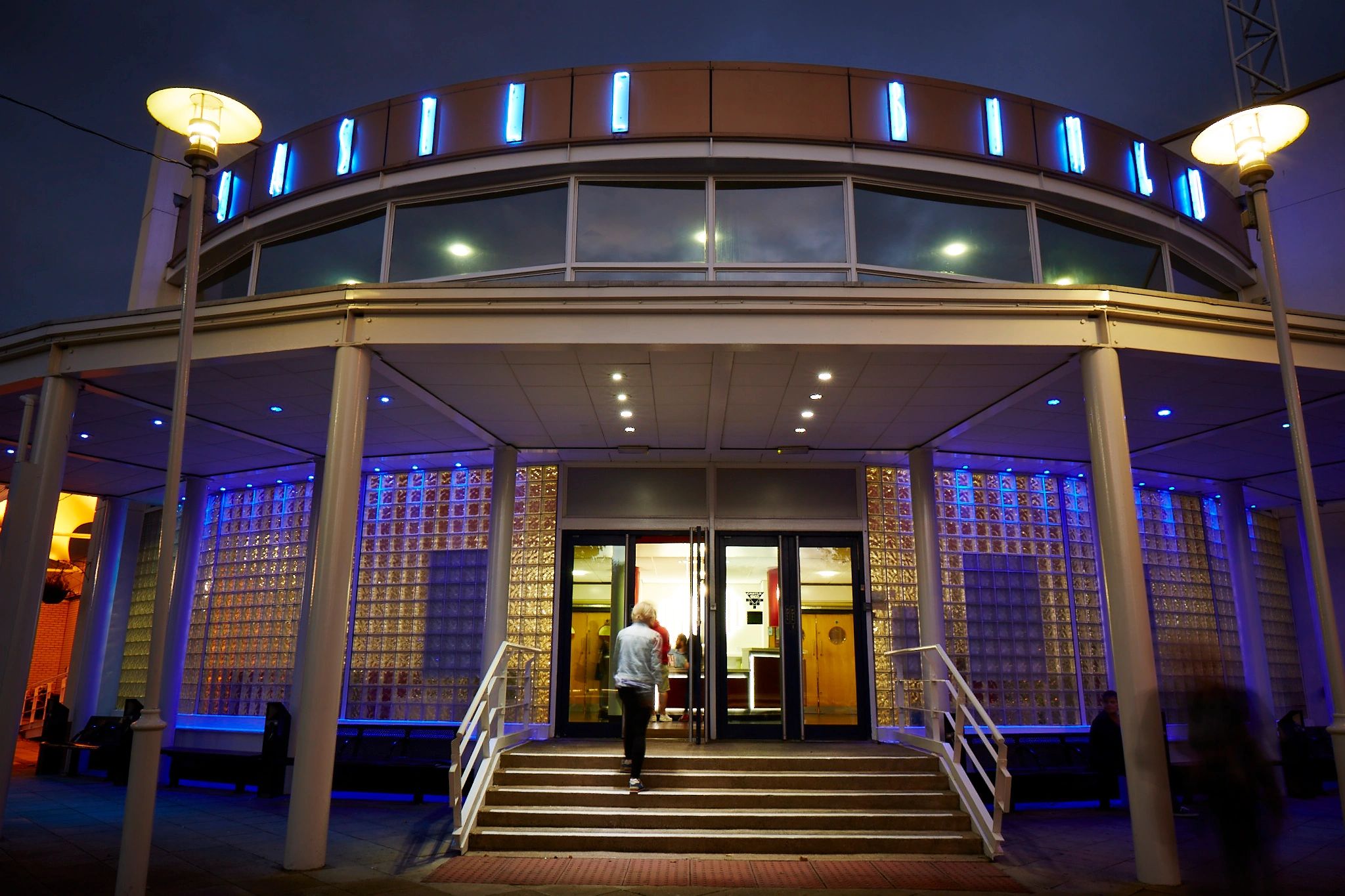A photograph showing the outside our Newport club during the night