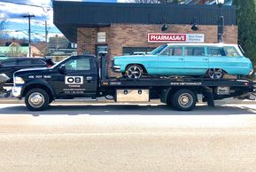 Tow truck toronto roadside assistance toronto flabed towing tire change jumpstart gas delivery