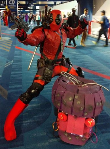 Deadpool from deadpool movies superhero character in Houston for a birthday party with props