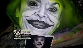 Custom airbrushed motorcycle gas tank with Jack Nicholson photo playing "The Joker" nay Kid Styles