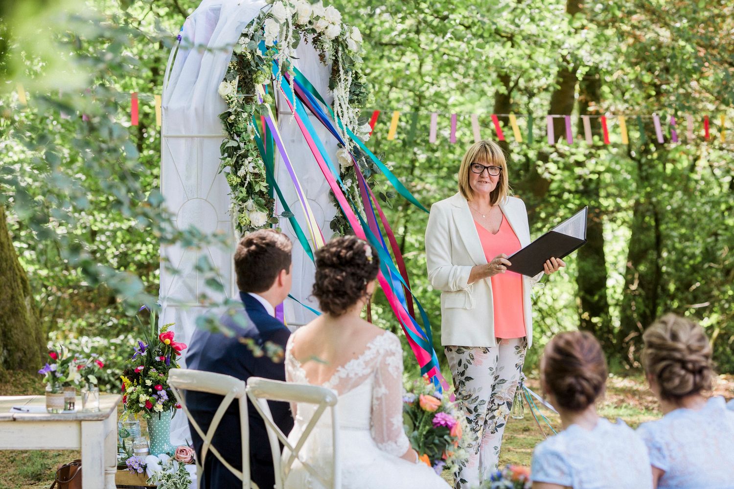 Bruce and Holly's fabulous festival themed celebrant led woodland wedding ceremony.