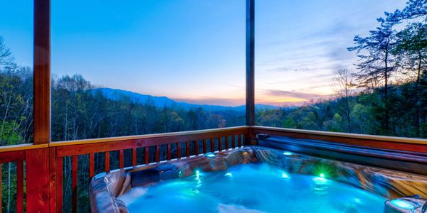 hot tub with mountain view at gatlinburg rental cabin