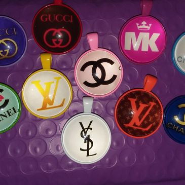 Gucci, Louis Vuitton, Yves Saint Laurent, Michal Kors, & Chanel.