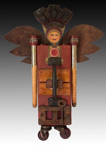 Guardian of the Home. Mixed media assemblage artwork. Created out of reclaimed materials and vintage