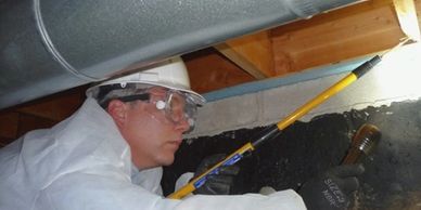Plymouth Michigan, Home inspector inspecting crawlspace. Contact Home Inspector for inspection quote