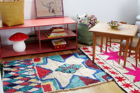 Handmade Moroccan wool carpets with intricate geometric motifs, diamond patterns & Berber graphics.