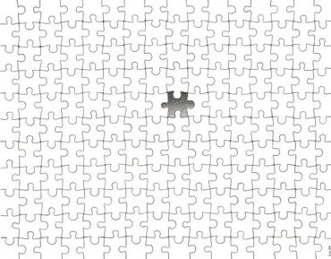 pen and ink drawing of white puzzle pieces with one darkened in the middle