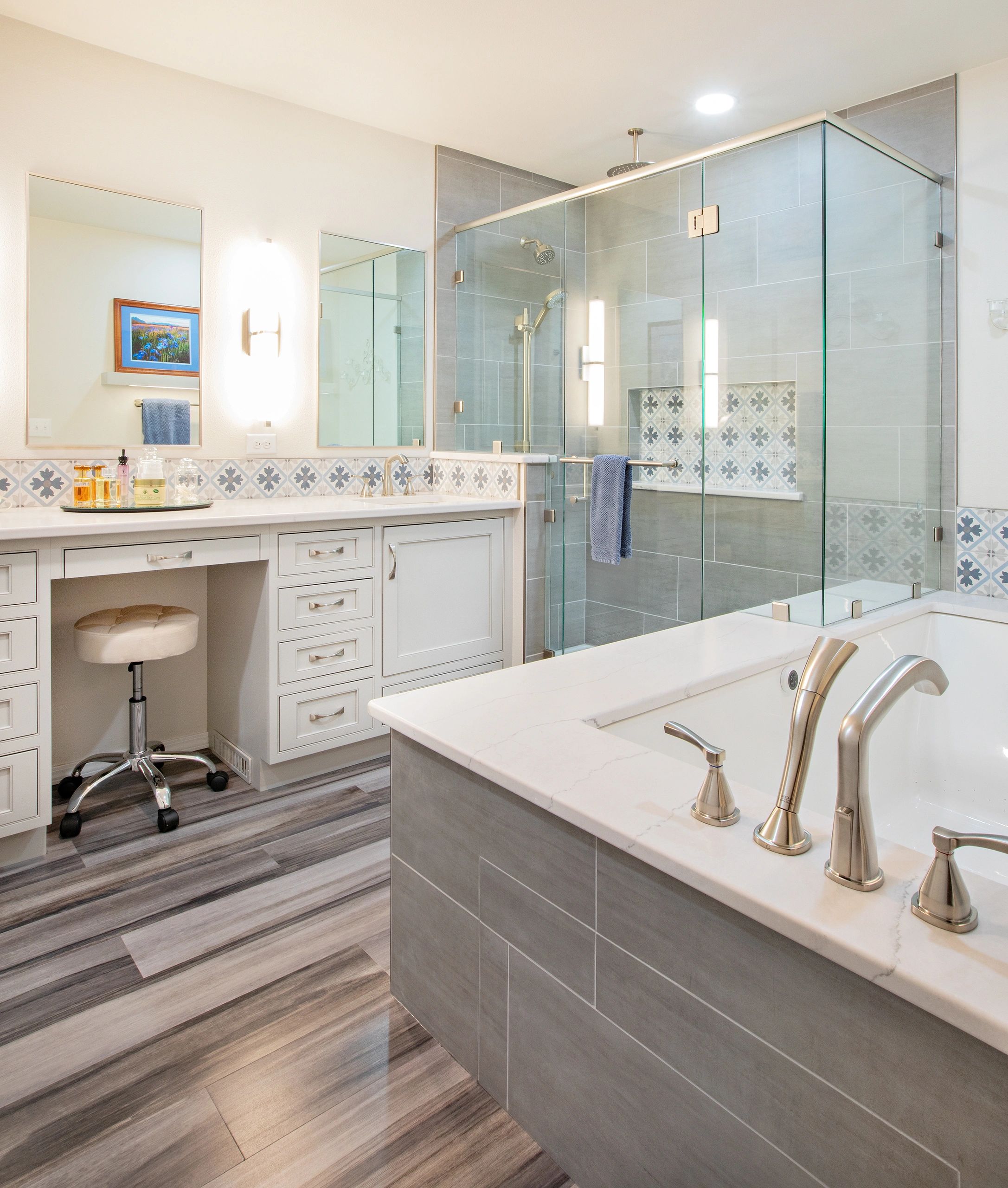 gray bathroom
grey bathroom
luxury vinyl floor
crystal cabinets
inset cabinets
surface art tile