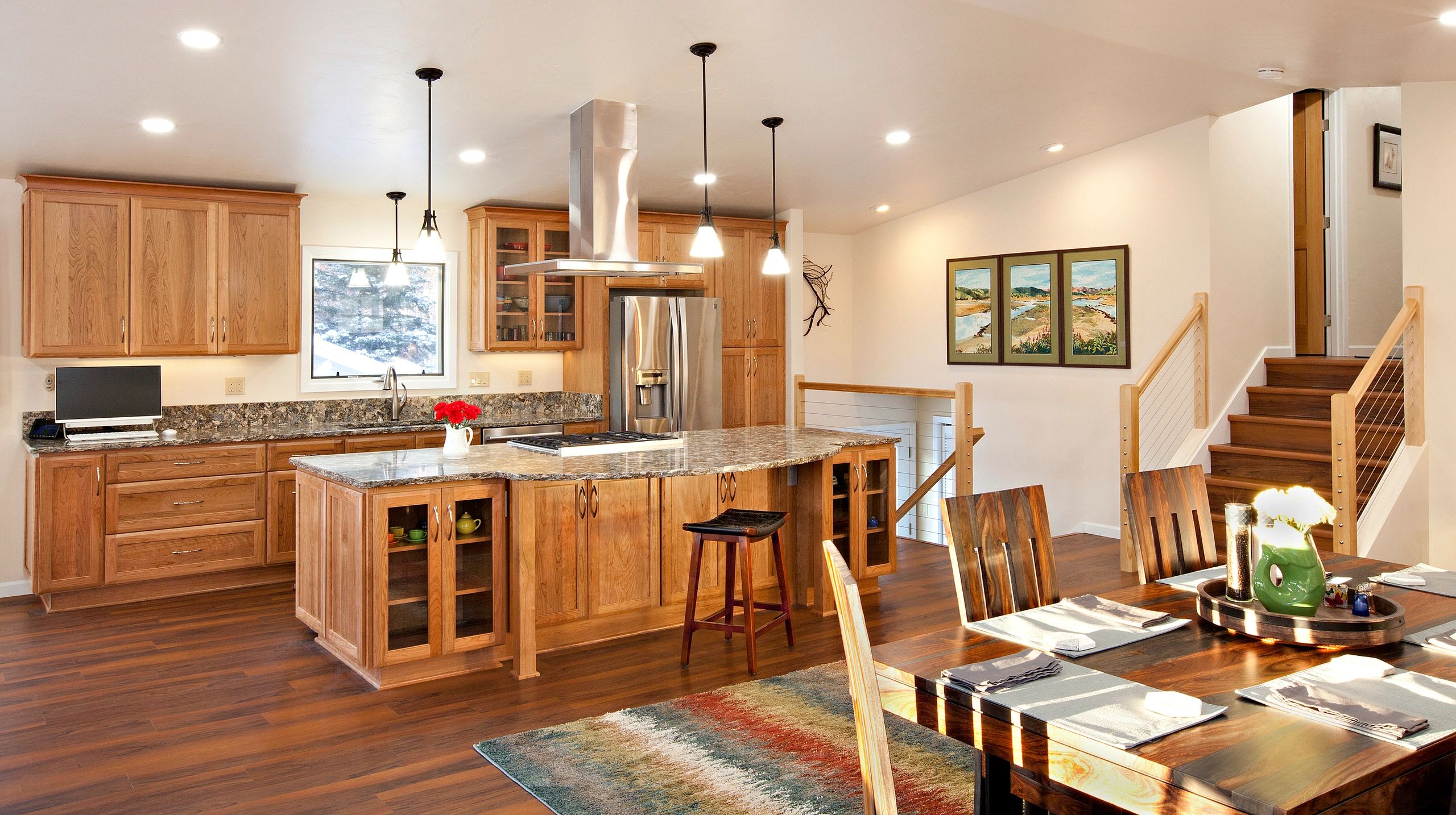 Cherry kitchen remodel
crystal cabinets
open floor plan
cable handrail
luxury vinyl floor
island kit
