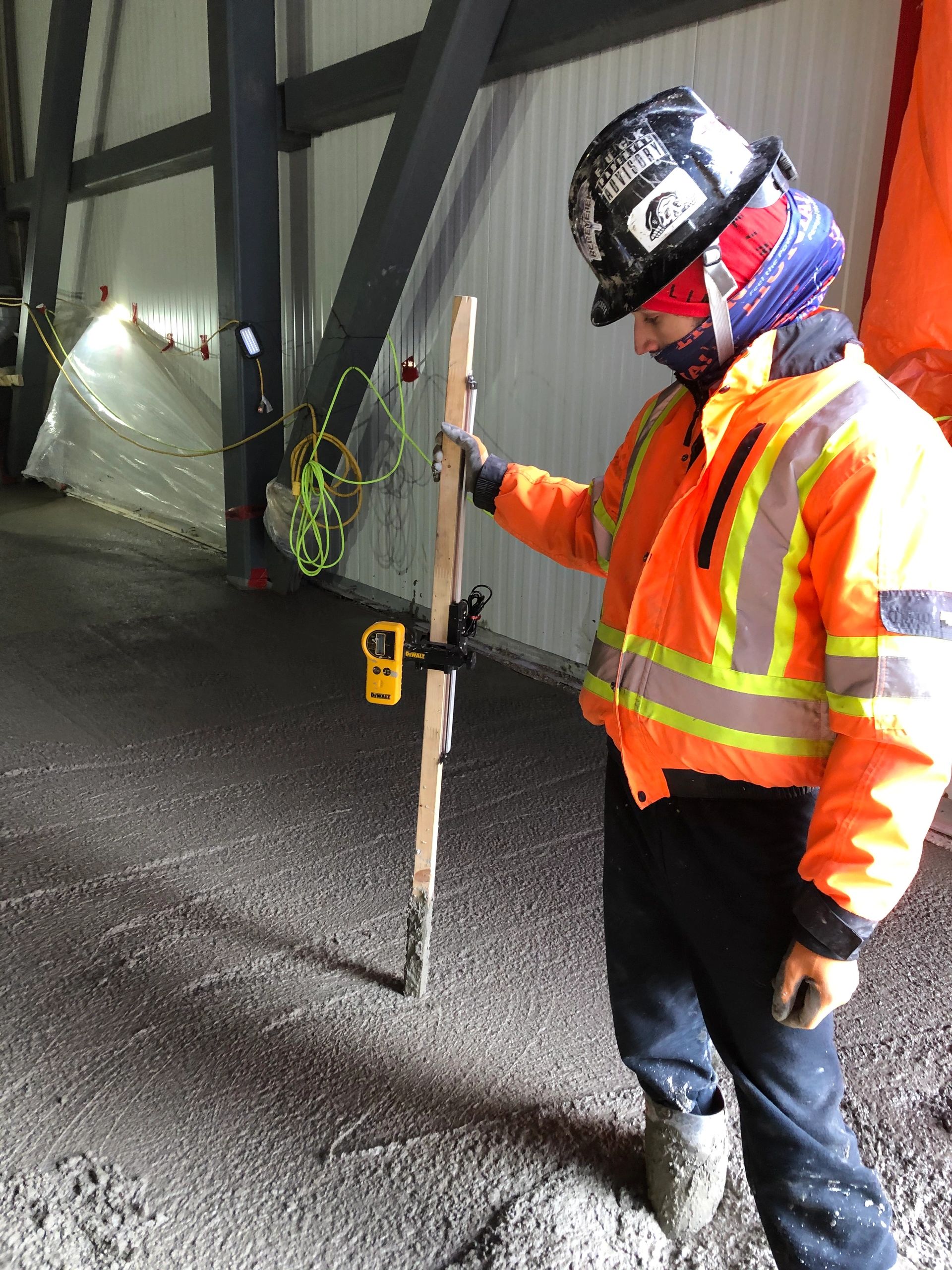 Checking levels with a rotary laser and laser stick SURESHOT