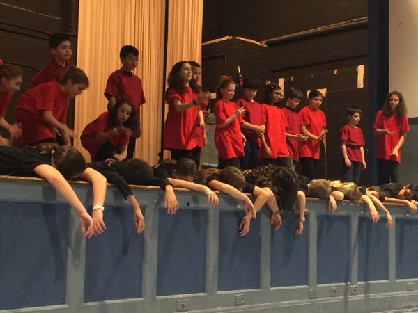 Choral teams of Marc Antony and Brutus.