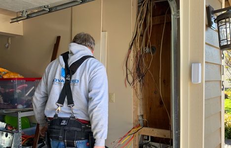 Electrician replacing electrical panel