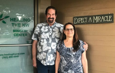 Marc & Lydia Buchheit in front of the healing the northwest office