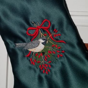 Custom embroidery, stocking, military guidons, scrubs, blankets, and clothing.