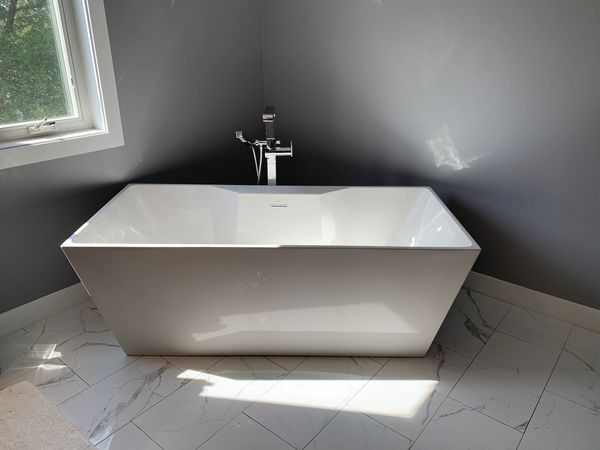 bathtub, window, tile floor instalation. wall painting