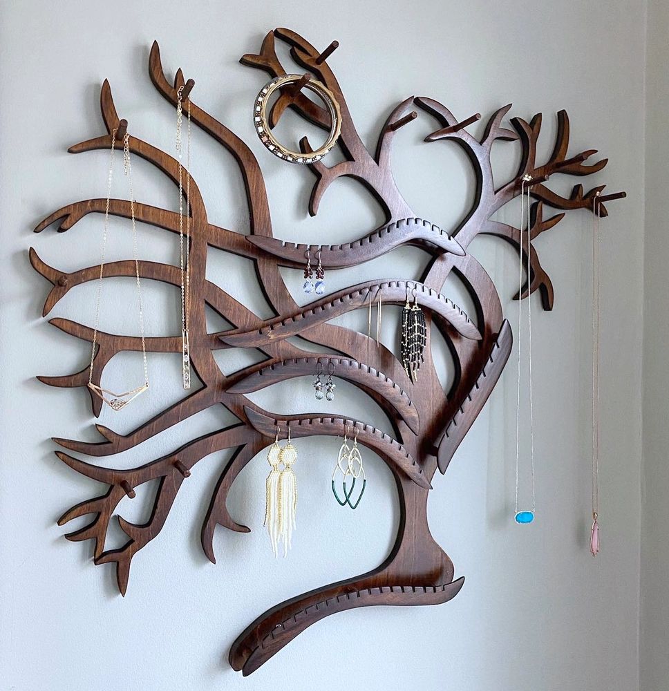 Jewelry displays and organizers that blend handcrafted wall art with practical design.