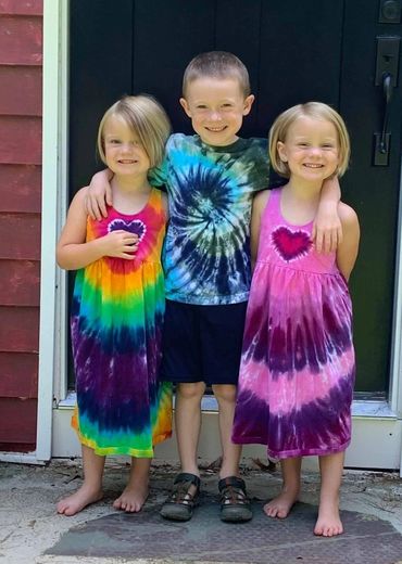 Tie dye jumper dresses and t-shirt.