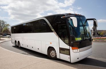 New Motorcoach Charter Bus standing ready