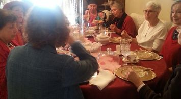 gathering of women at table for HIgh Tea
