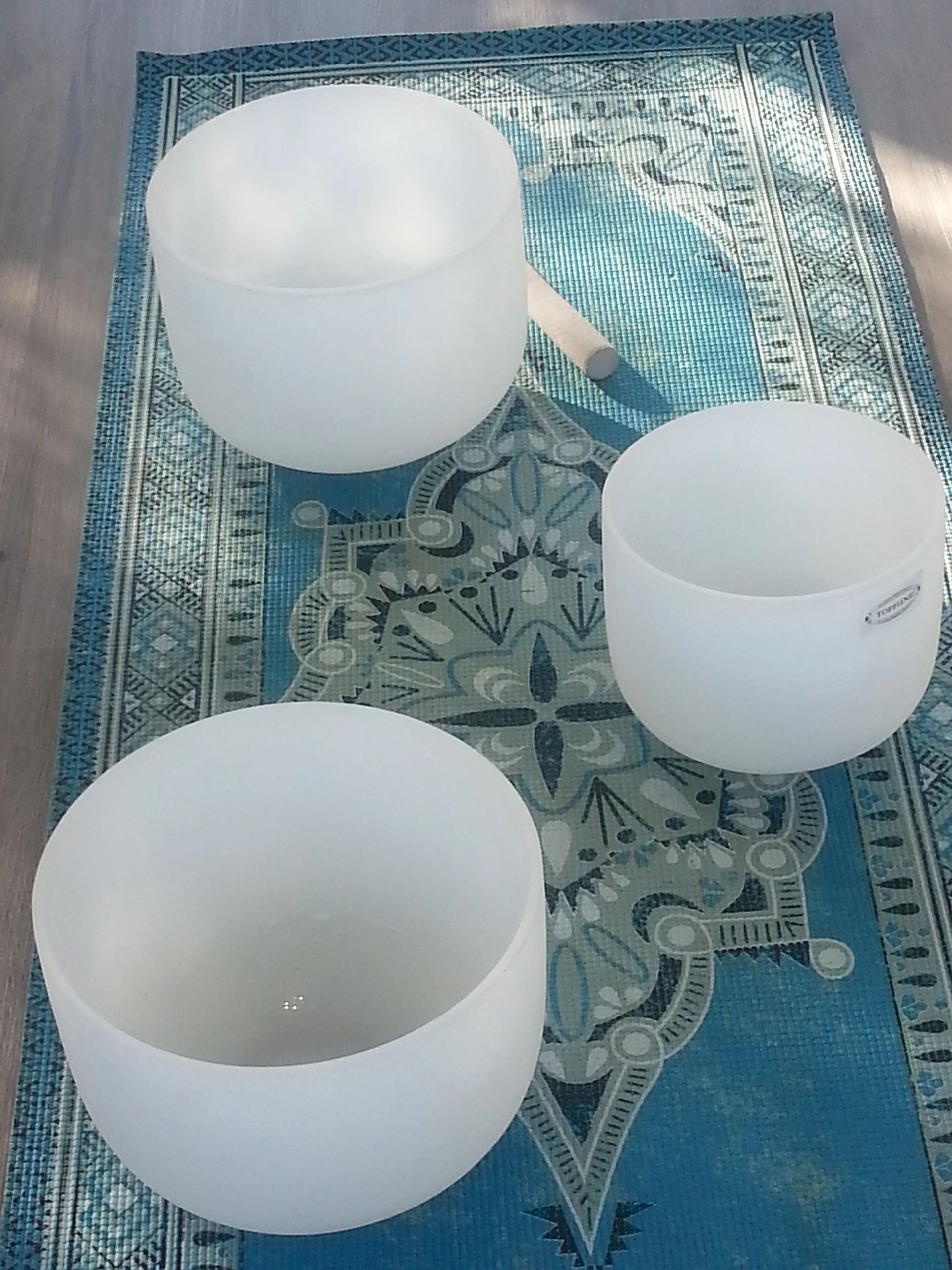 sound bowls on yoga mat