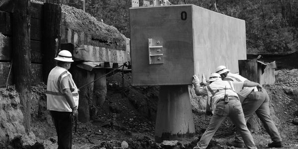 Installation of pre-cast bent being lowered onto male cone as part of the Conical Connection System