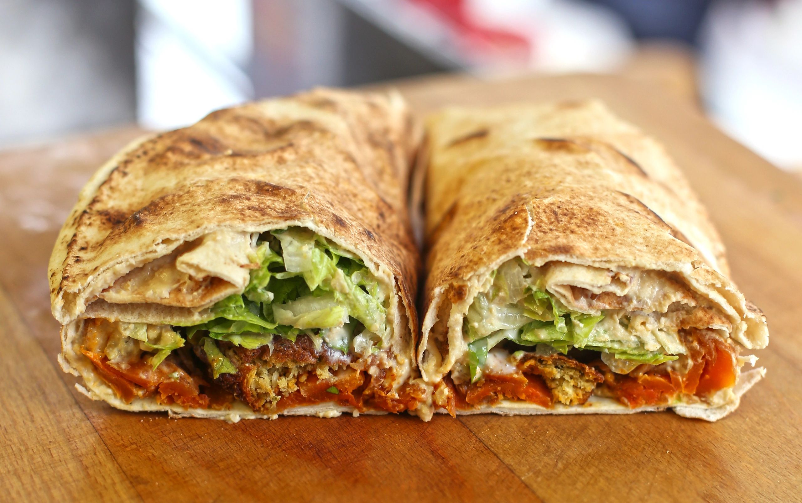 Hot Fiery wrap cut in half. Vegan street food on the go, for two!