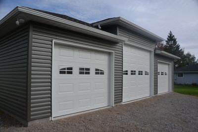 3 bay garage build with horizontal siding