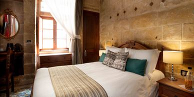 Wheelchair accessible ground floor bedroom. Room de Leon at The 3Cities Auberge