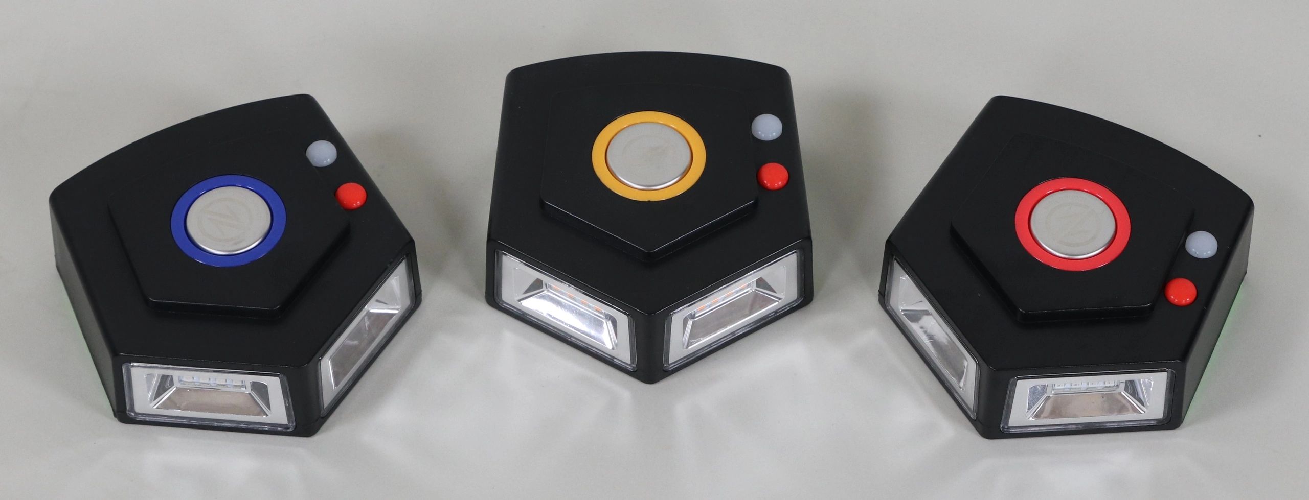 Top image of the iZonus traffic safety lights. Notice two large, easy-to-find buttons (in the dark)