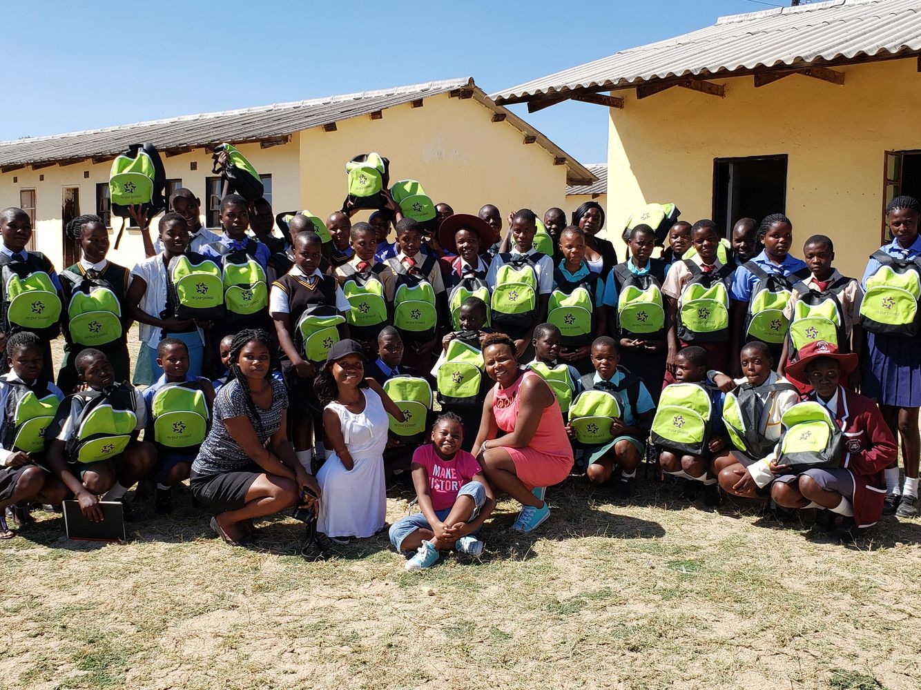 Girls from impoverished families in Zimbabwe receive backpacks filled with toiletries & stationery