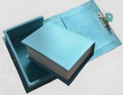 This image shows a beautifully crafted book with a matching protective box.