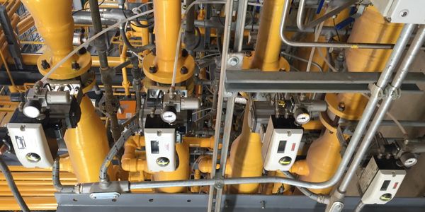 Natural gas piping and controls for industrial burner system.