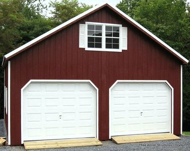 Two story A-frame Garage on a driveway