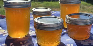 Vanilla Bean & Peach Jelly with a rainbow.