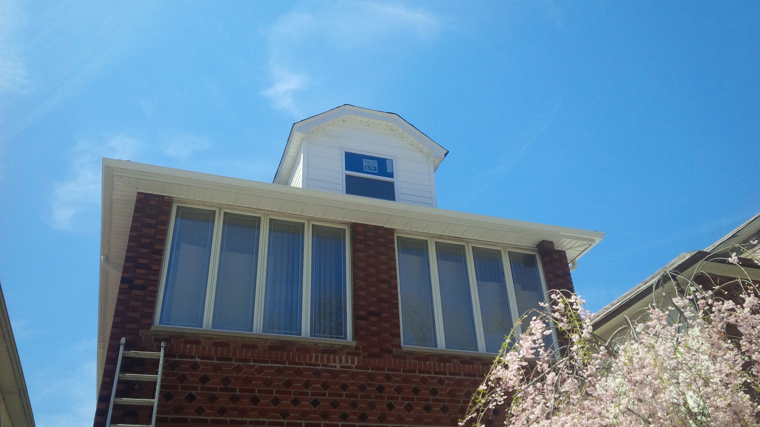 After picture of a siding and window installation in Midwood Brooklyn NY. By qualified roofers