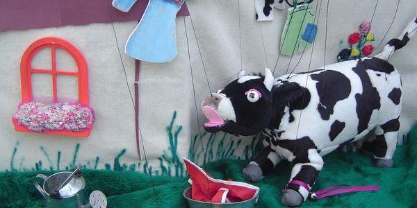 Cow marionette puppet from puppet show available in New England.