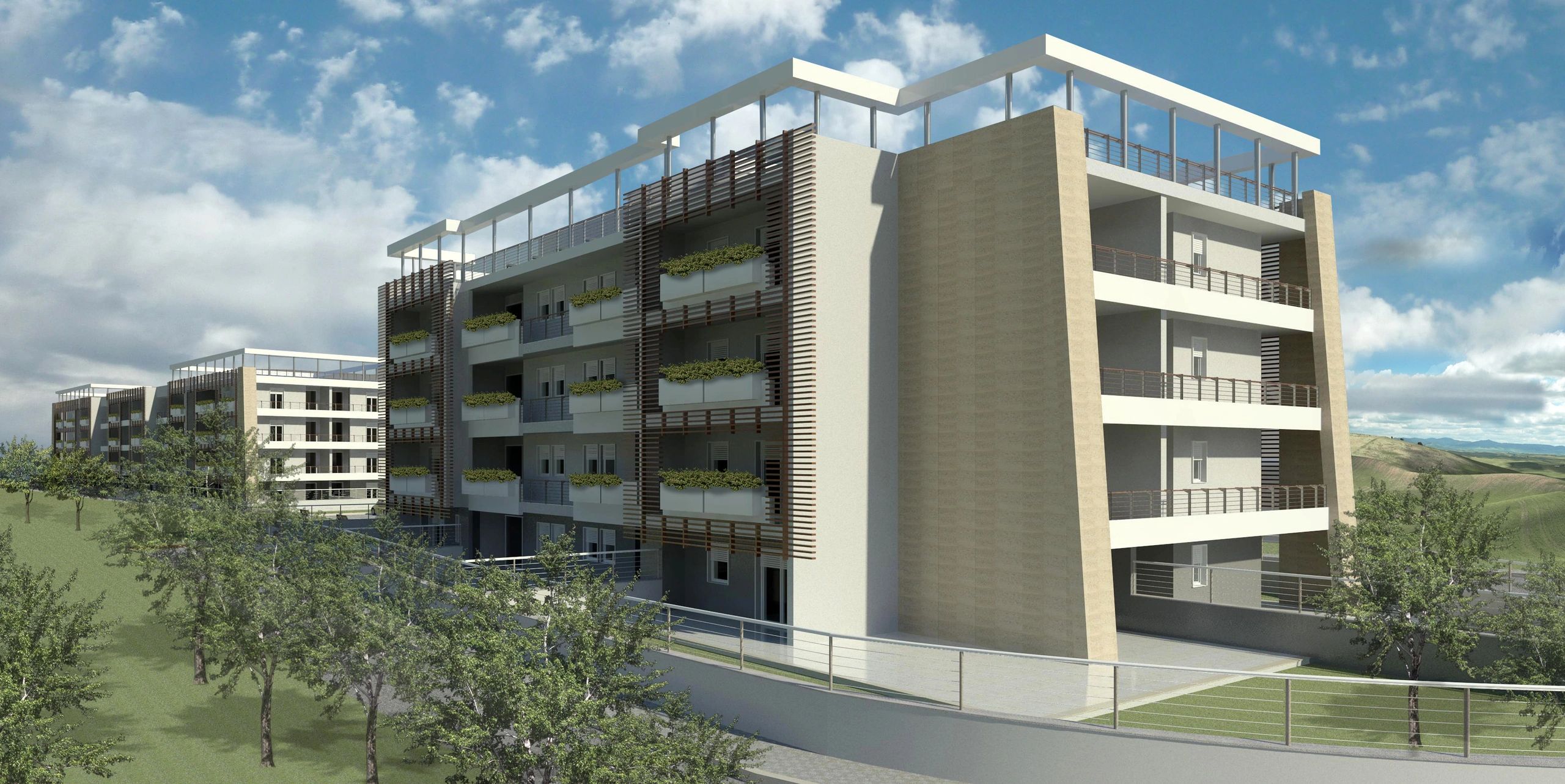 Palazzina moderna con ampi balconi verdi, struttura elegante e vista panoramica sul verde.