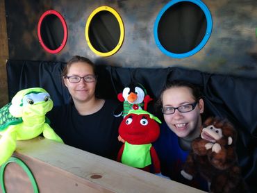 Hannah and Abigail getting ready for a show.