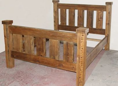reclaimed solid wood bed made with 200 year old wood