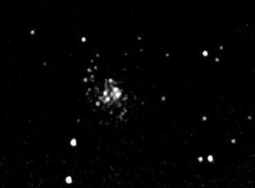 Converted color image, it is one of more remote globular clusters, lying well beyond Galactic center