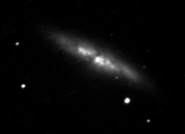 Galaxy with dust and bright knots