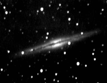 Dark lane of dust along its length, one of my favorite objects