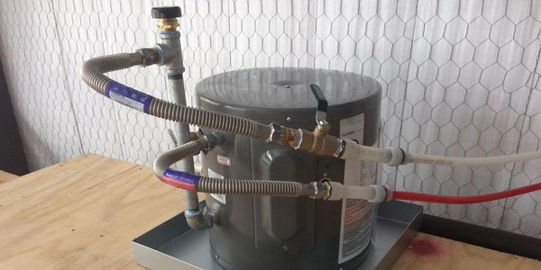 water heater on wooden floor