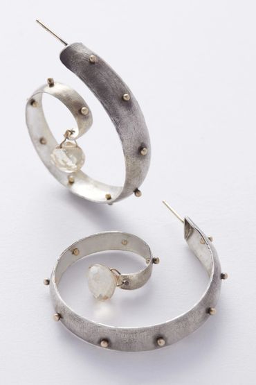 Girl Meets Joy Jewelry Diego anticlastic curled hoops with 14k rivets, 14k ear posts and pale facete
