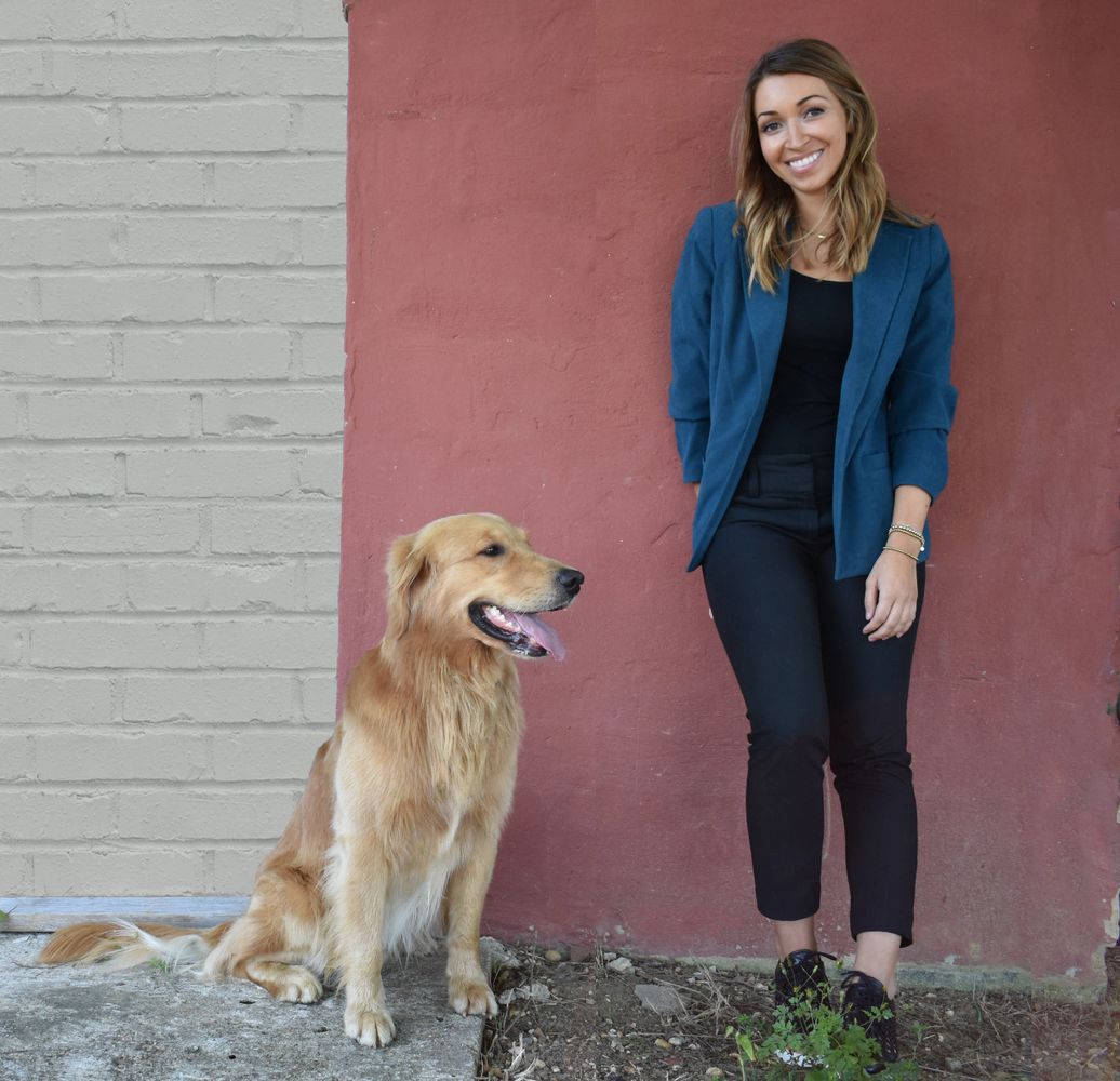 Dr. Nicole Moore and service dog. Dr. Moore is a therapist providing therapy and assessments