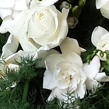 Custom floral wreaths and sprays made with the freshest flowers for your loved ones.