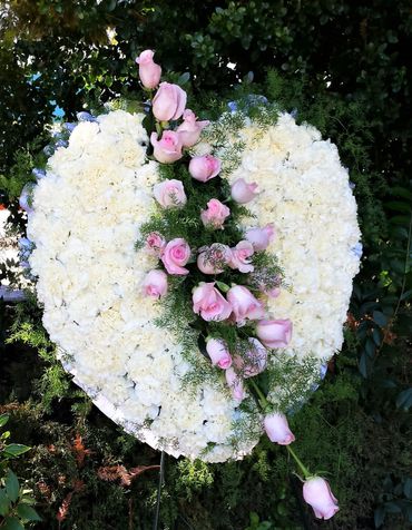 Flowers for Celebration of Life ceremonies. Call for custom floral sprays and arrangements.